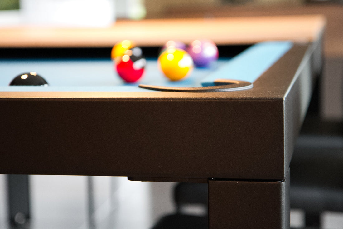 Practical and fun: unpacking the convertible billiard table trend